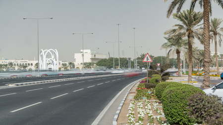 Islamin monument. Alrumeilah Family Park's symbolic entrance timelapse, behind the Corniche in Doha,...