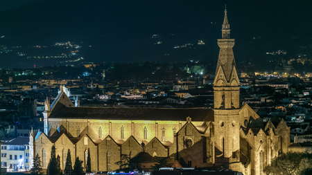 Basilica Santa Croce in Florence at night timelapse - viewed from Piazzale Michelangelo. Evening illumination. Aerial top viewの写真素材