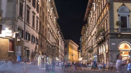 Cozy narrow street near Duomo in Florence timelapse, Tuscany, Italy. Architecture and landmark of Florence. Night Florence cityscapeの写真素材