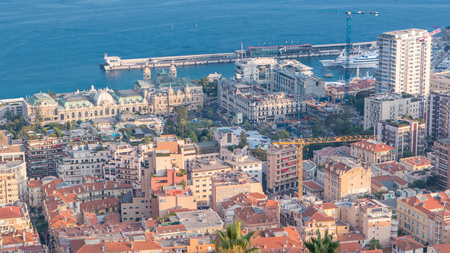 Cityscape timelapse of Monte Carlo, Monaco with roofs of buildings and casino square during summer...