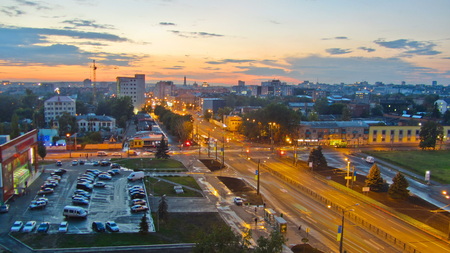 Kharkiv city from above day to night transition timelapse. Aerial view of the city center and residential districts. Traffic on Gagarin avenue. Ukraine.の写真素材