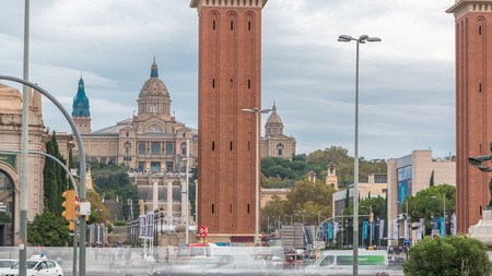 BARCELONA, SPAIN - CIRCA OCTOBER 2018: Cityscape view of Placa d'Espanya or Spain square, with the Venetian Towers and the National Art Museum . Traffic on circle roundaboutのeditorial素材