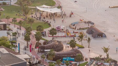 Waterfront overview Jumeirah Beach Residence JBR skyline aerial timelapse. Shops, restaurants and...