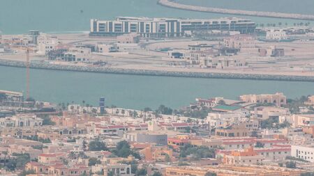 Aerial view of Dubai man made Daria Island, Dubai, United Arab Emirates. Evening view from above