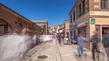 Walk on street in Bascarsija, an oriental bazaar and an old Ottoman historic center of Sarajevo timelapse hyperlapse, Bosnia and Herzegovina. Many shops and caffes aroundの写真素材