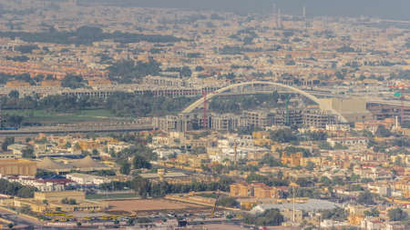 Dubai water canal with pedestrian bridge over it aerial timelapse.の写真素材