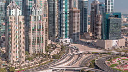Skyscrapers of Dubai Marina near intersection on Sheikh Zayed Road with highest residential...