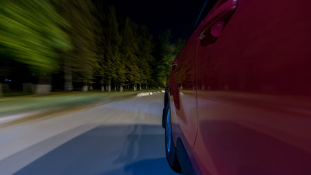 Drivelapse from Side of Car moving on a night highway timelapse hyperlapse, road with lights...
