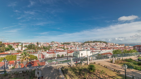 Panorama showing aerial view over the center of Lisbon timelapse from Miradouro de Sao Pedro de Alcantaraの写真素材