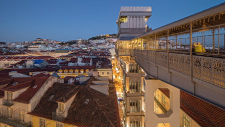 Panorama showing Alfama and Baixa districts of Lisbon aerial day to night timelapse, Portugalの写真素材