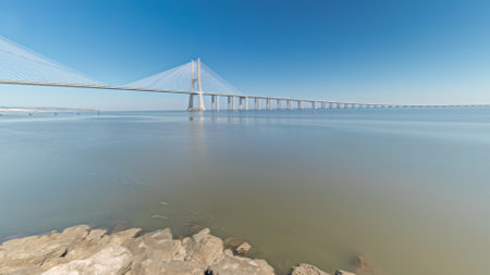 Motion from the low to high tide next to Vasco da Gama Bridge in Parque das Nacoes timelapse in...