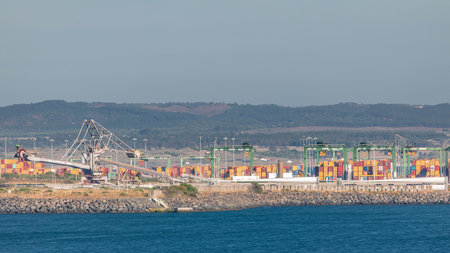 Aerial view of container cargo terminal of commercial port timelapse, business logistics and transport industry in Sines, Portugal.の写真素材