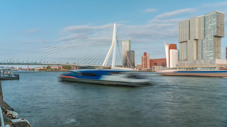 Timelapse of Erasmus Bridge, called The Swan, spanning the Maas River in Rotterdam, Netherlands.の写真素材