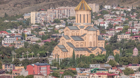 Tsminda Sameba Cathedral or Holy Trinity Cathedral of Tbilisi aerial timelapse. Georgiaの写真素材