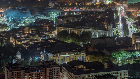 Public Service Hall seen from viewpoint in Tbilisi city illuminated at night timelapse. Georgiaの写真素材