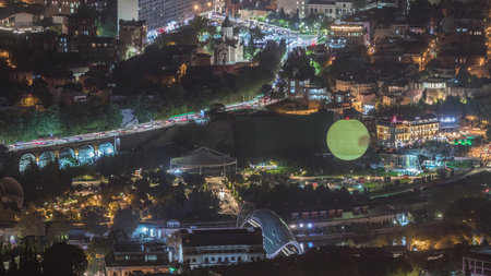 Aerial night timelapse of Rike Park, a modern urban park in Tbilisis Old Town. Georgia
