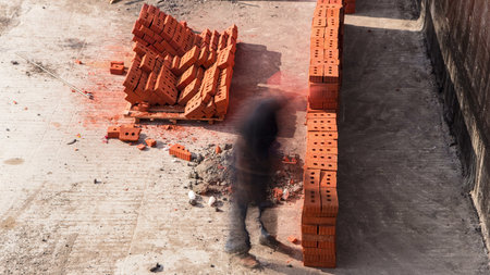 Bricklayers laying bricks to make a walls timelapse.の写真素材
