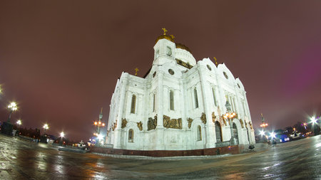 Majestic orthodox Cathedral of Christ Saviour illuminated at dusk on bank of Moscow river. Timelapse hyperlapse, Russiaの写真素材