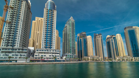 Dubai Marina towers in Dubai at day time timelapse hyperlapseの写真素材
