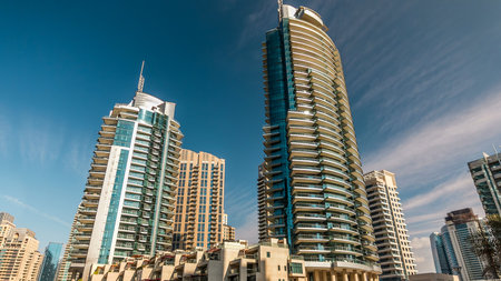 Dubai Marina towers in Dubai at day time timelapseの写真素材