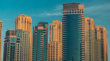 Morning view of Dubai Marina towers in Dubai timelapseの写真素材