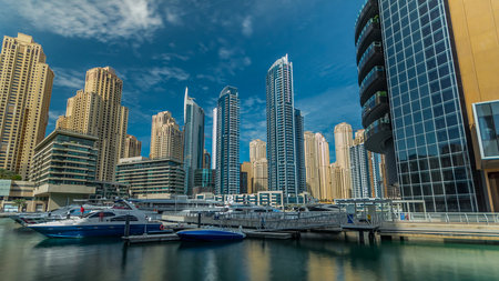 Dubai Marina towers in Dubai at day time timelapse hyperlapseの写真素材