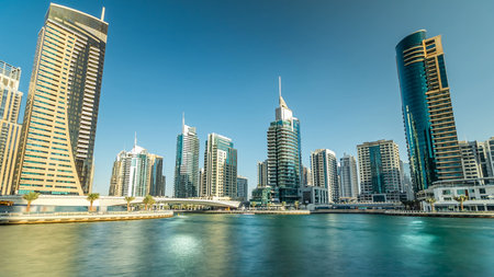 Dubai Marina modern towers in Dubai at day time timelapseの写真素材