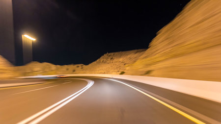Curvy road through the Jebel Hafeet road timelapse hyperlapse, Al Ain, United Arab Emiratesの写真素材