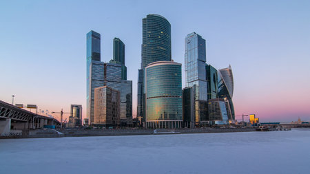 Moscow City skyscrapers in winter day to night timelapse.の写真素材