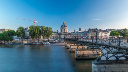 People walk on the Bridge of Arts over the River Seine to the Institute of France timelapse hyperlapse - Paris, Franceの写真素材