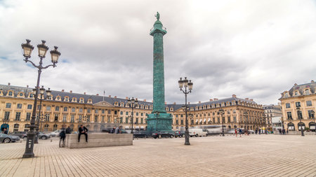 Vendome column with statue of Napoleon Bonaparte on the Place Vendome timelapse hyperlapse. Paris, France.の写真素材