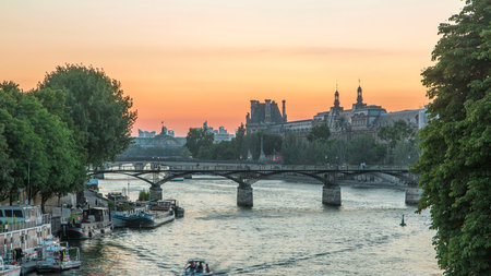 View to Pont des Arts in Paris after sunset day to night timelapse, Franceの写真素材