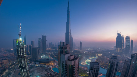 Foggy morning in downtown of Dubai night to day timelapse.の写真素材