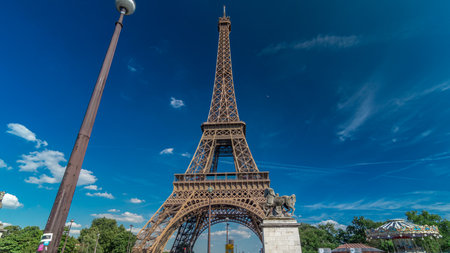 Eiffel Tower from bridge over Siene river in Paris timelapse hyperlapse, France