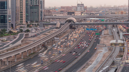 Aerial top view to Sheikh Zayed road near Dubai Marina and JLT day to night timelapse, Dubai.