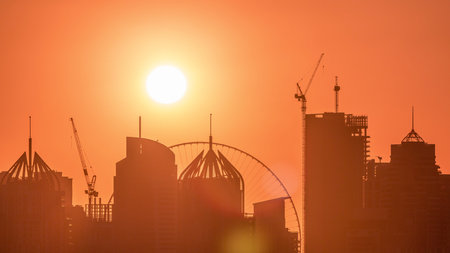 Dubai Marina skyscrapers from golf course sunset timelapse, Dubai, United Arab Emirates