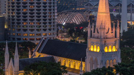 St. Andrews Cathedral aerial day to night timelapse. It is an Anglican cathedral in Singapore, the countrys largest cathedral.の写真素材