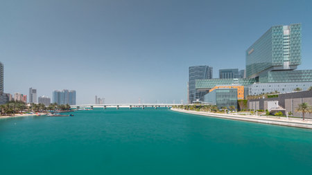 Modern buildings in Abu Dhabi skyline timelapse hyperlapse with waterfront.の写真素材