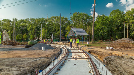 Workers install new tram rails during a reconstruction of the route timelapse.