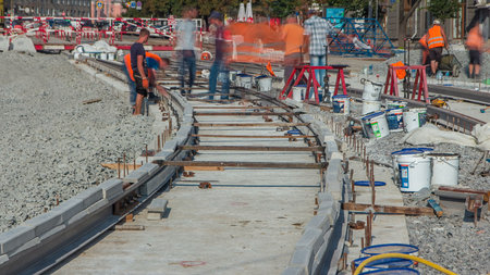 Repair works on the street timelapse. Laying of new tram rails on a city street
