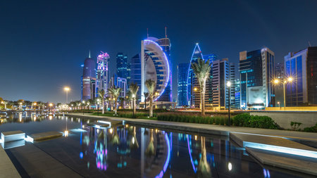 The skyline of Doha by night with starry sky seen from Park timelapse hyperlapse, Qatarの写真素材