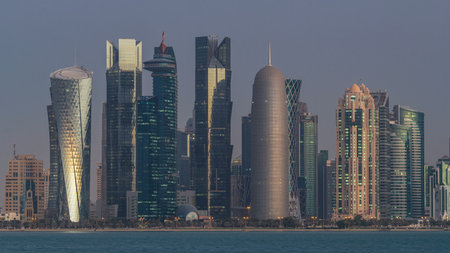 Skyline of Doha night to day transition timelapse in Qatar