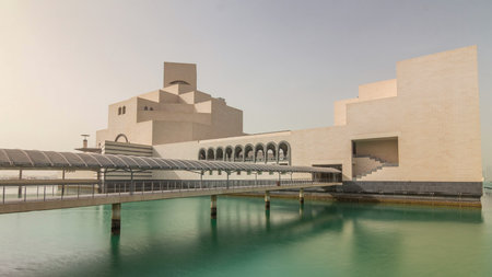 Qatars museum of Islamic Art timelapse hyperlapse on its man-made island besideの写真素材