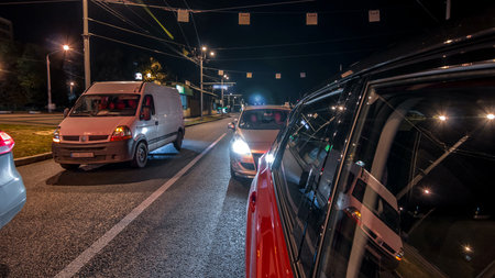 Drivelapse from side of car moving on a night avenue in city timelapse hyperlapseの写真素材