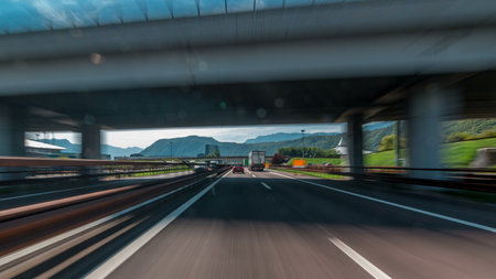 Driving on a highway through the mountains and meadows in Italy timelapse hyperlapse drivelapse