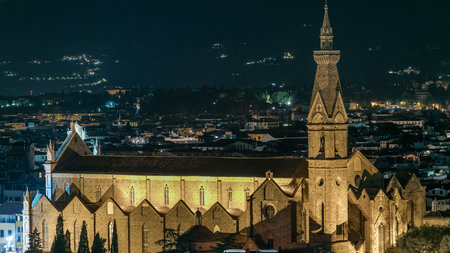 Basilica Santa Croce in Florence at night timelapse - viewed from Piazzale Michelangeloの写真素材