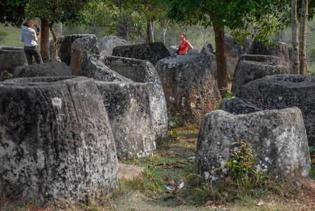 Mysterious ancient stones at sarchaeological site,and area of U.S. bombings during Vietnam war.near Phonsovan,Laosのeditorial素材