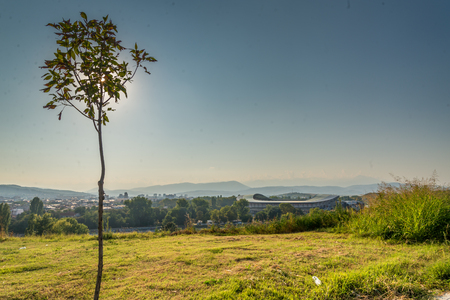 Shoot from a hill overlooking the city and it's sports stadium.の写真素材