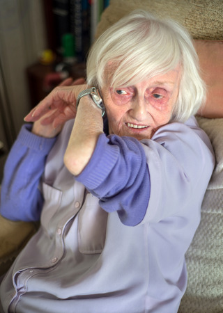 macular degeneration makes life difficult so this speaking wrist watch helps by audibly telling you the time. for visually impaired people.の写真素材