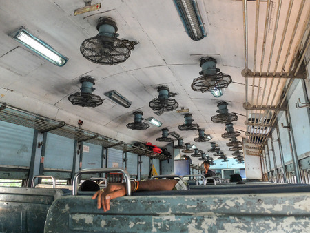 Inside Indian train 2nd class non a/c seated only,travelling from Margao,Goa to Gokarna in India.